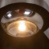 Circular bar in brushed metal, wood and carpet. 1970s.