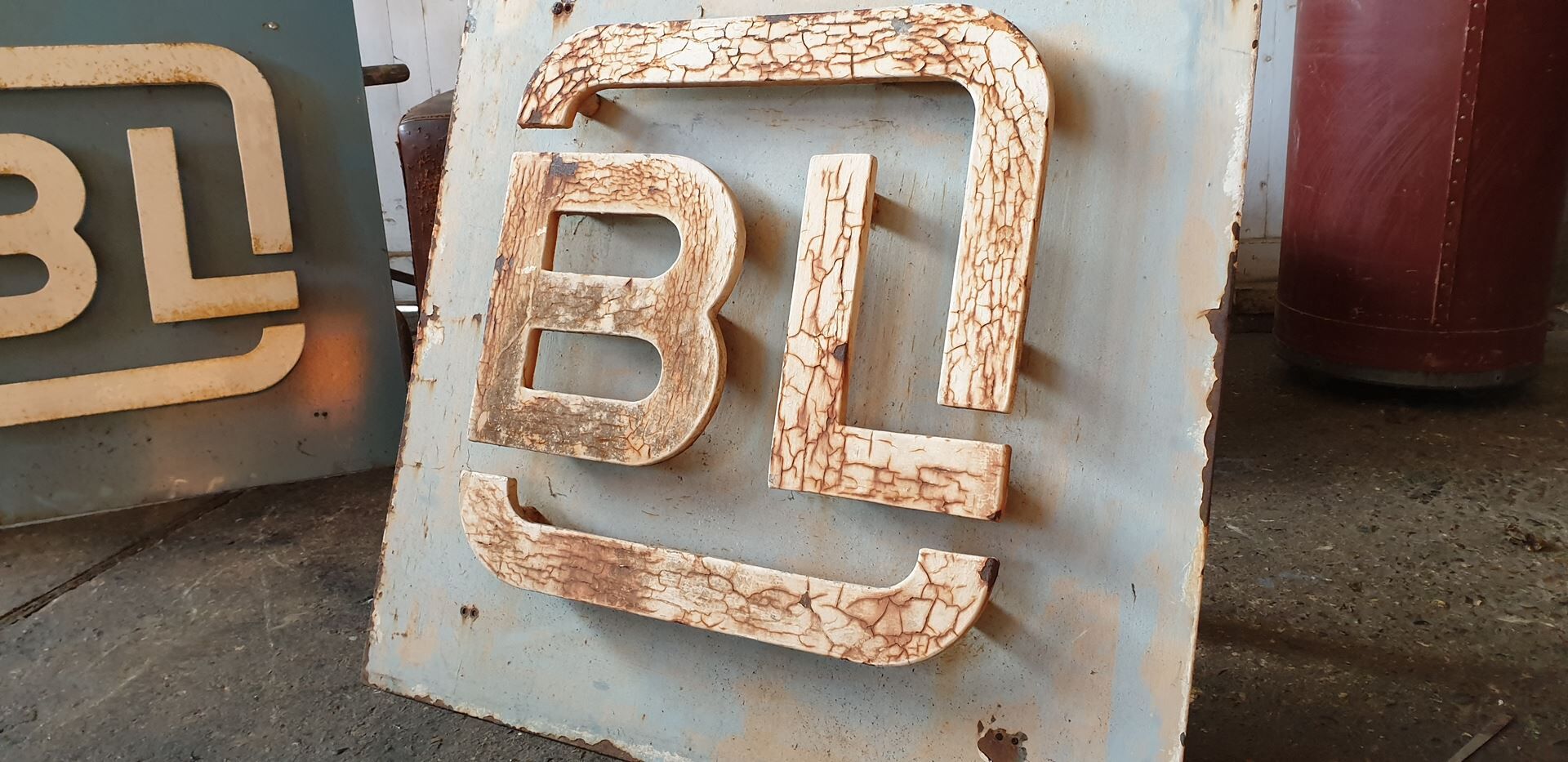 Old metal factory sign