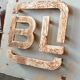 Old metal factory sign