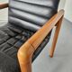Pair of vintage Flototto armchairs in leather and wood, 1980s.