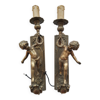 Paires d'appliques bougeoirs chérubins