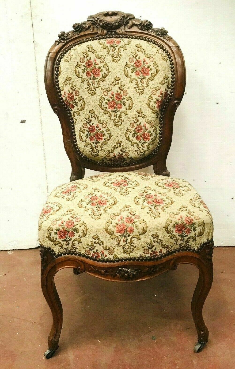 Pair of Napoleon III chairs in 19th century carved mahogany