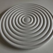 White glazed earthenware potter's trivet