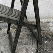 Black wooden folding chair