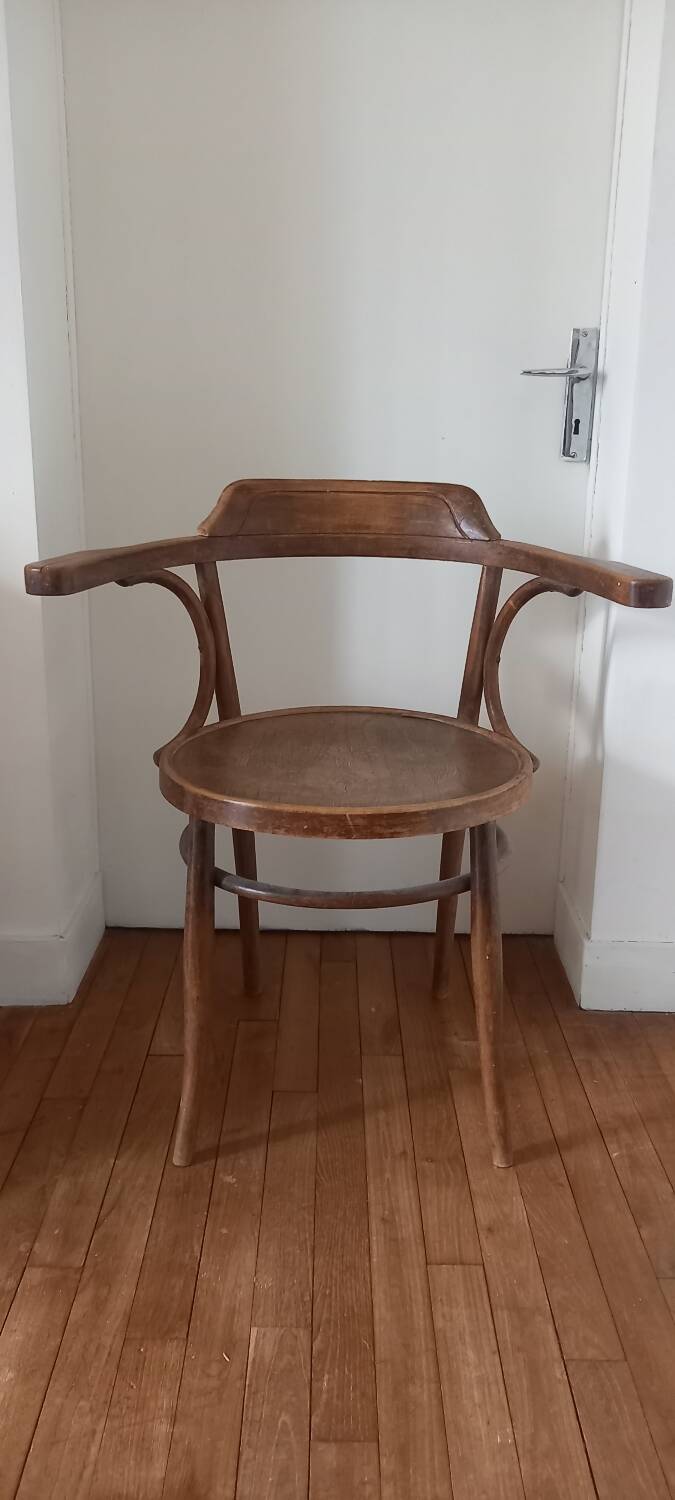 Curved wood armchair