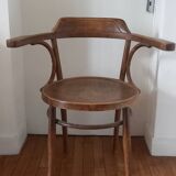 Curved wood armchair