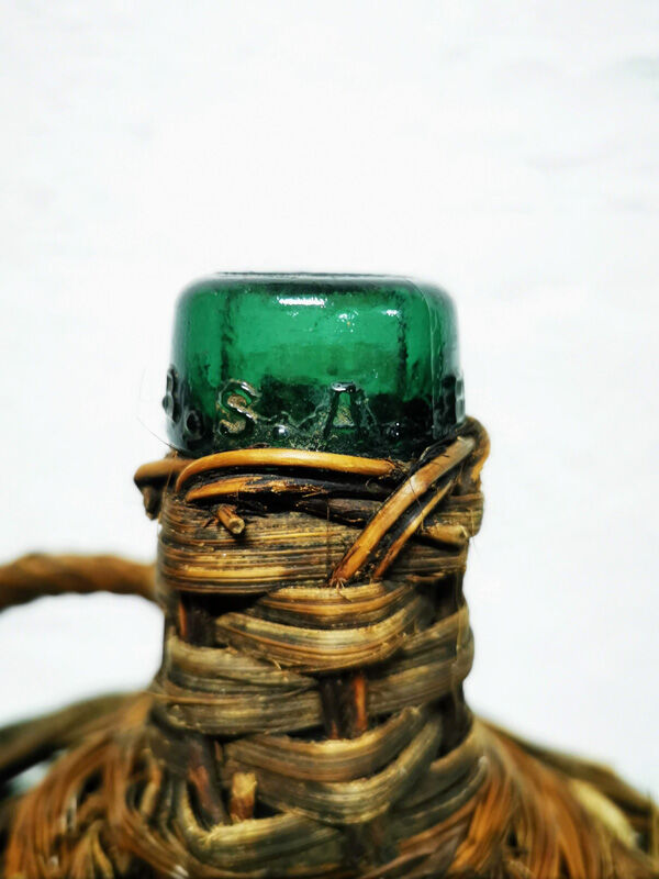 Demijohn dressed in wicker