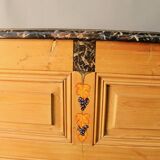 Counter bank with grape decoration