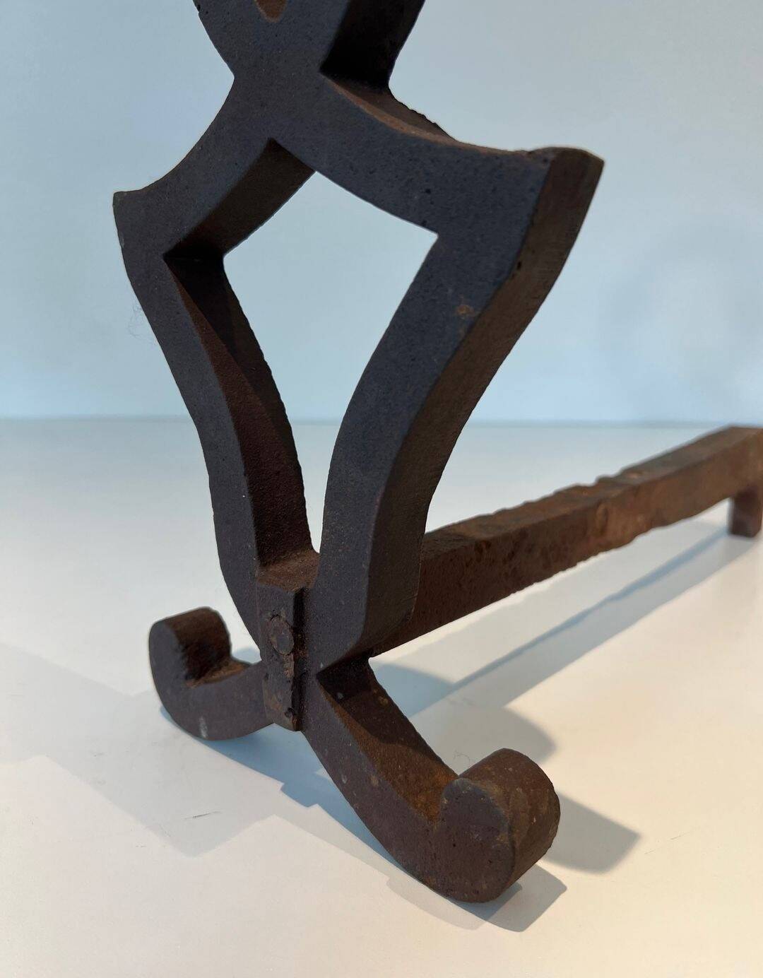 Pair of Modernist Andirons in Cast Iron with Stylised Figure Supports, by Ray