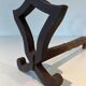 Pair of Modernist Andirons in Cast Iron with Stylised Figure Supports, by Ray