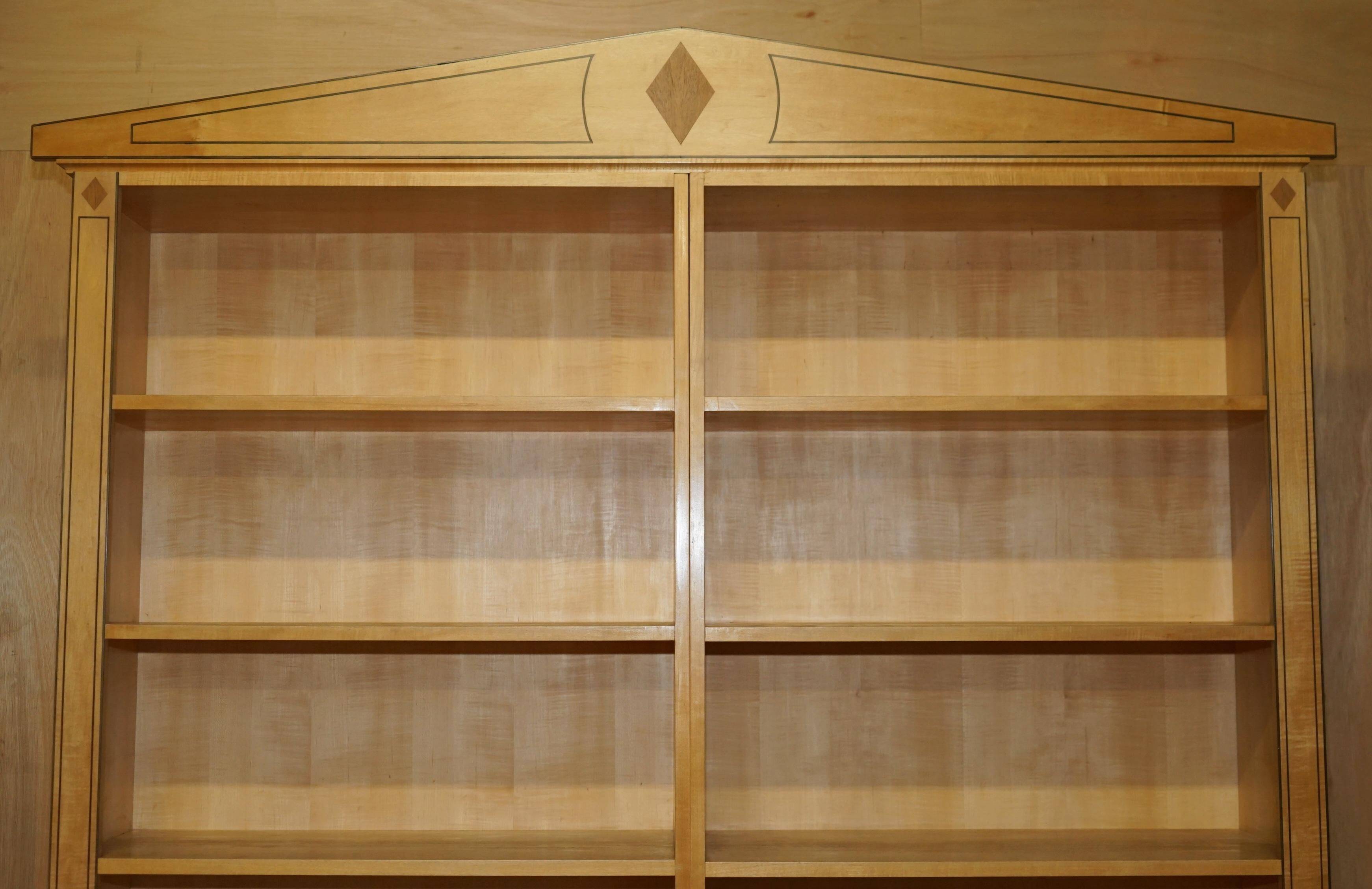 Pair of large open bookshelves in satin birch and walnut, height 2.5 m.