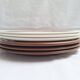 Assiette plates à fleurs marron années 1970