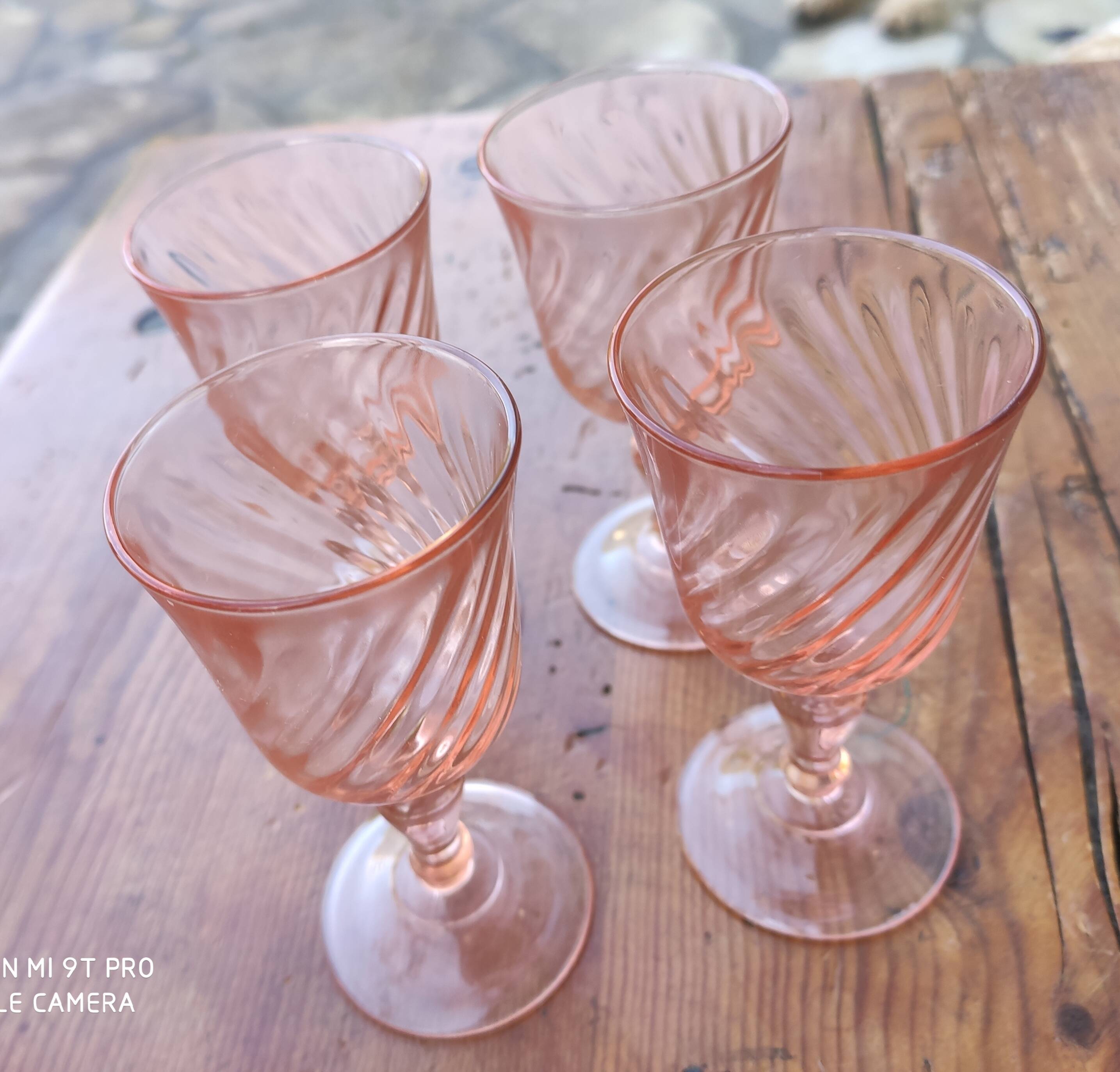 set of vintage pink glasses