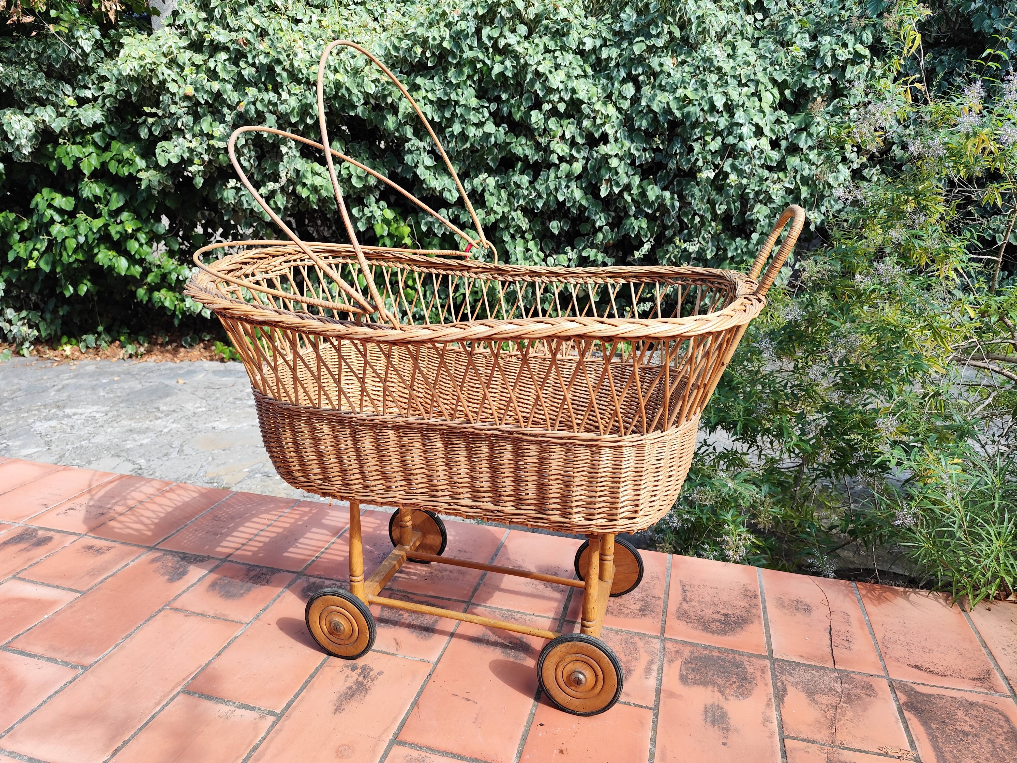 Vintage rattan Alsatian doll cradle bassinet