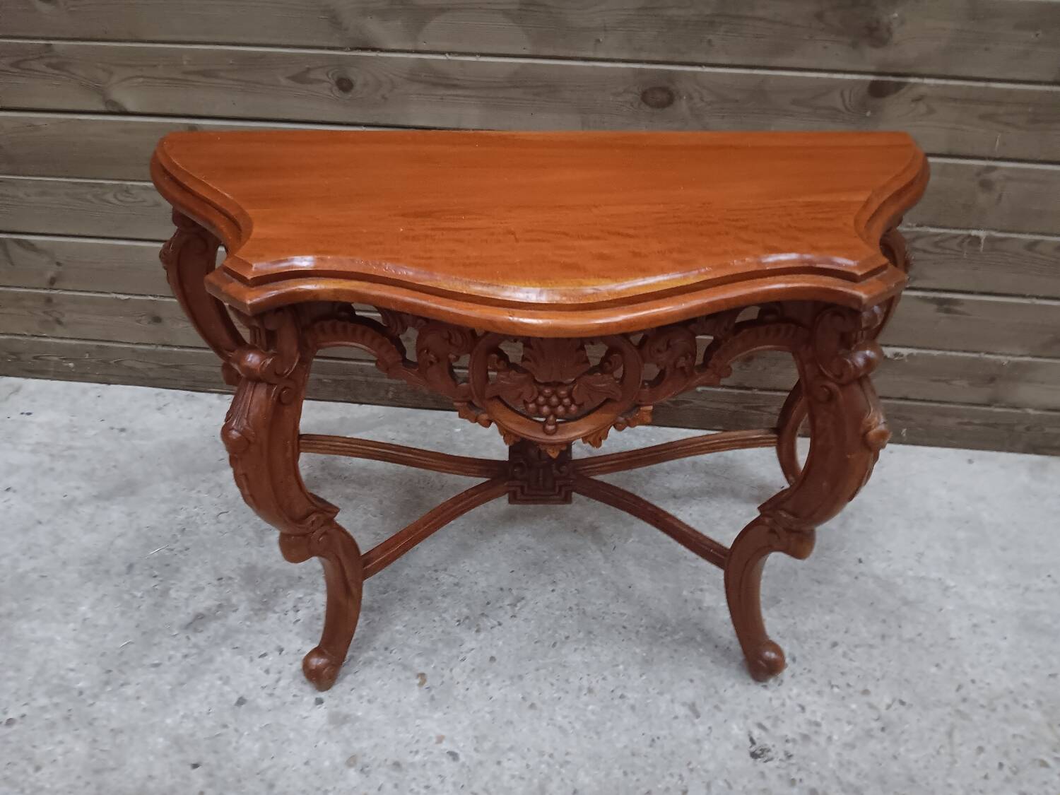 Carved wooden console