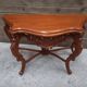 Carved wooden console