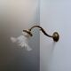 Bronze and pressed glass wall light. 1940