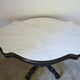 Table violon Napoléon III en bois noirci et marbre blanc, XIXe siècle
