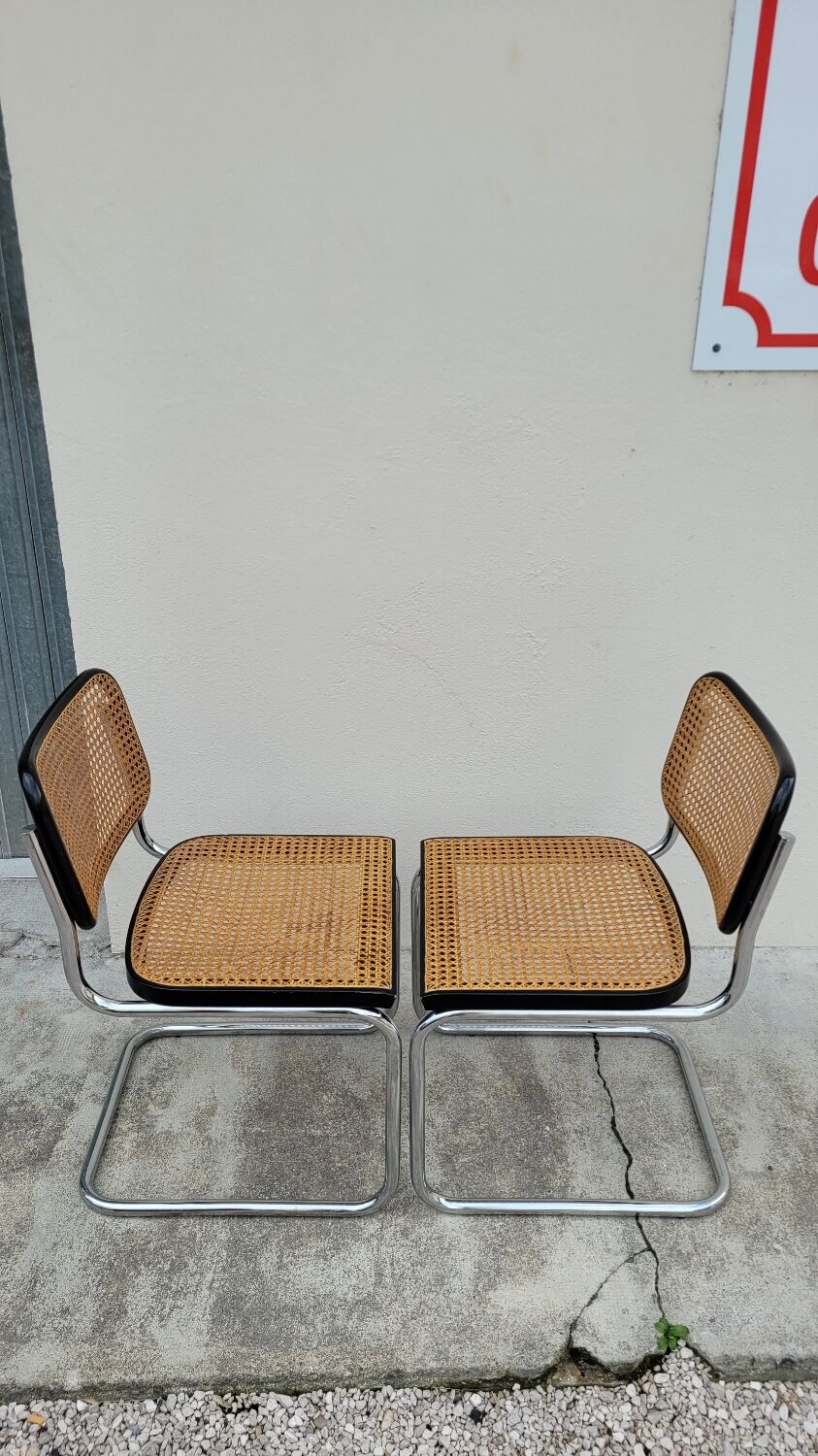 Pair of chairs by Marcel Breuer in black canework model B32 signed Italy