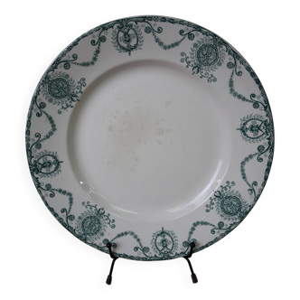 Ancien plat rond en Terre de Fer modèle Pierrefonds