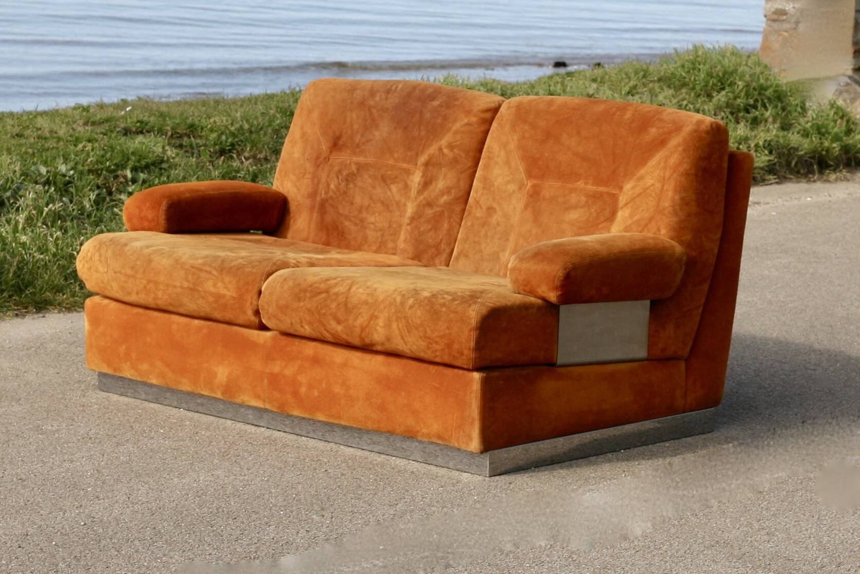 Orange suede leather and steel sofa. Circa 1970