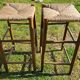 2 high stools sitting straw