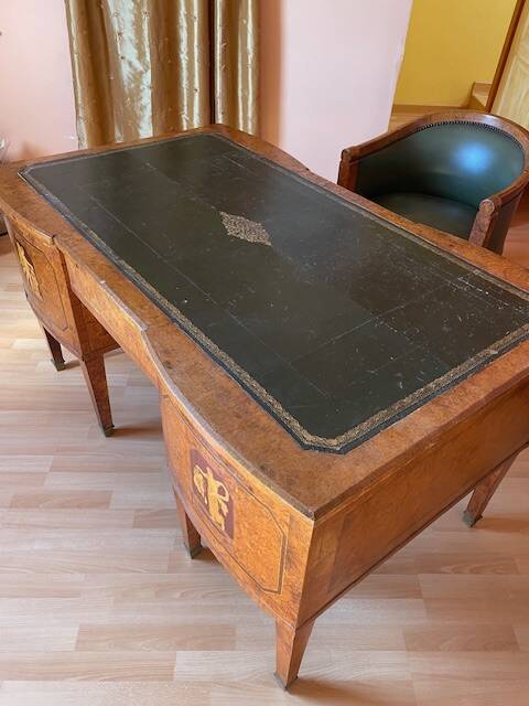 Antique Empire-style desk in burr veneer, green leather, with a dash.