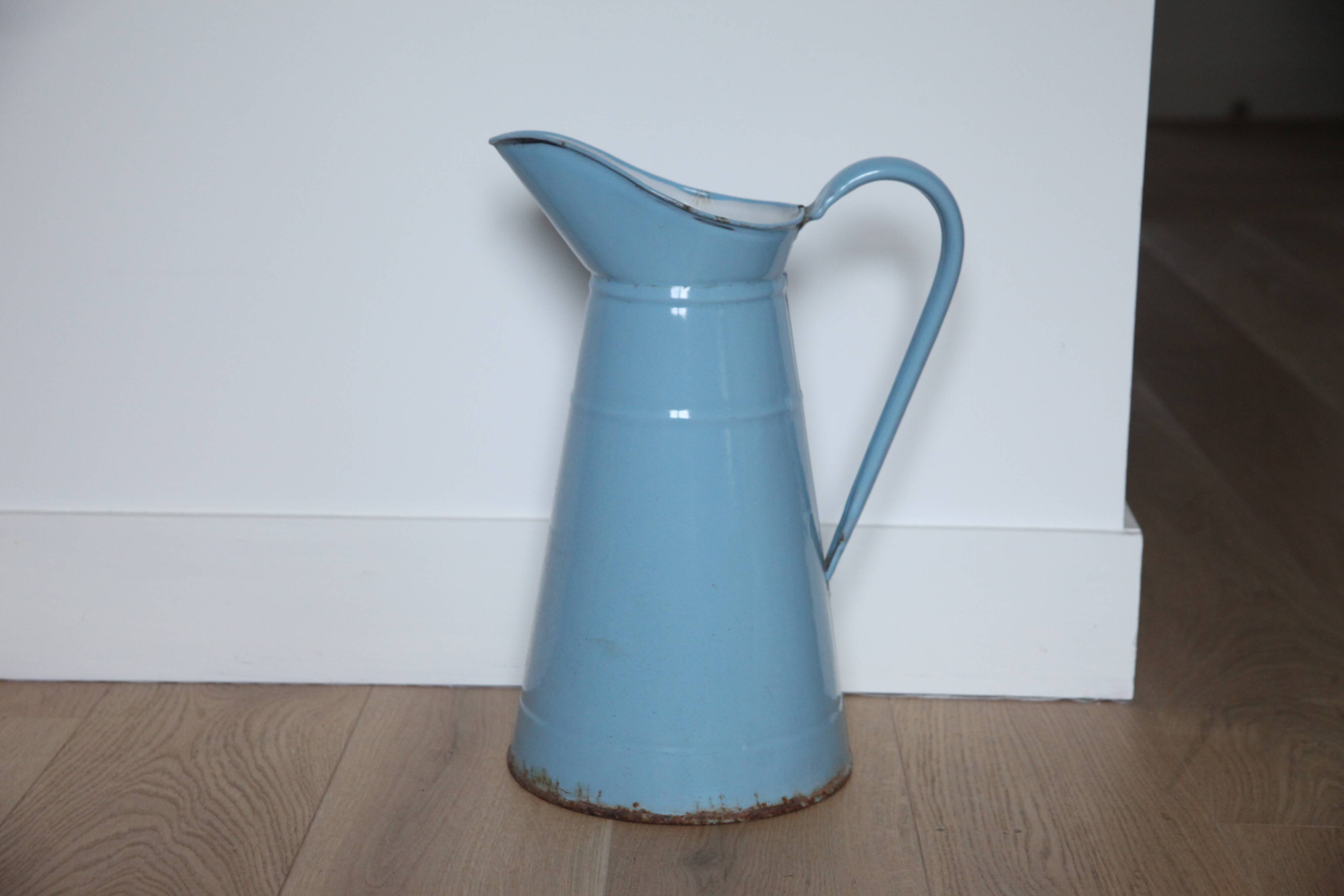 Enamelled metal jug
