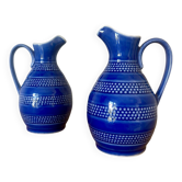 Set of two small 33 cl blue ceramic jugs.