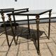 Nested tables in gilded brass in the style of Maison Charles.