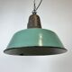 Industrial green enamel factory lamp with cast iron top, 1960s