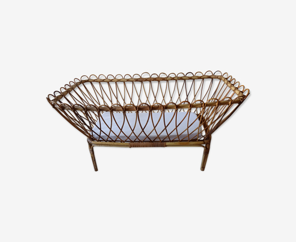 Old rattan cot measuring long