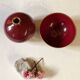 Raspberry-colored ceramic soliflore vase and bowl, enhanced with gilding, Arabia, Finland