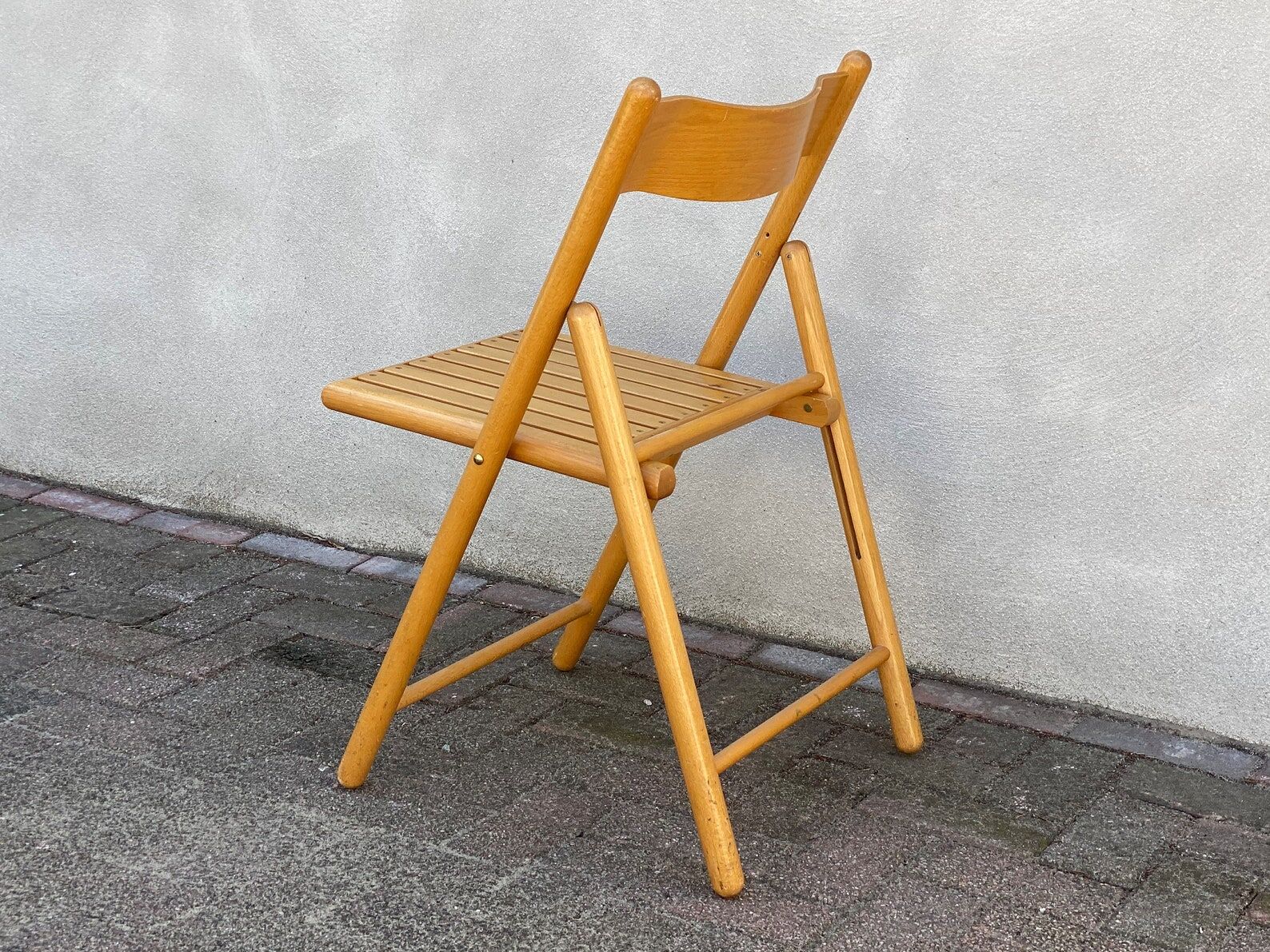 Mid Century wooden folding chair with a slat seat