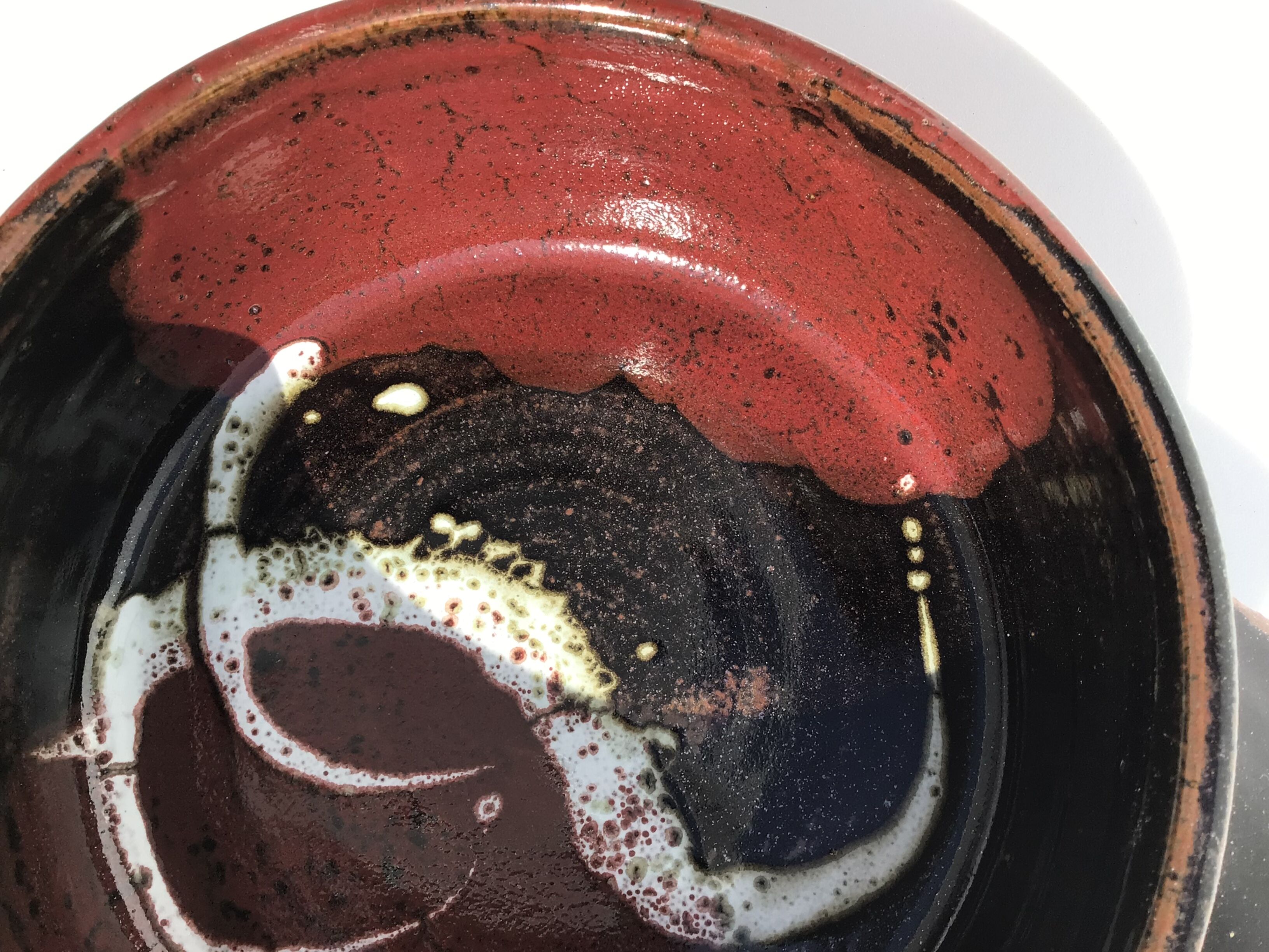 Artisanal sandstone dish signed Guibert red brown decorated