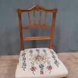 Chaise basse tapissée