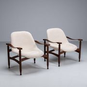 Pair of “Tiki” lounge chairs in teak and bouclé Busnelli Italy 1960