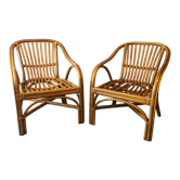 Duo of rattan armchairs with cushions
