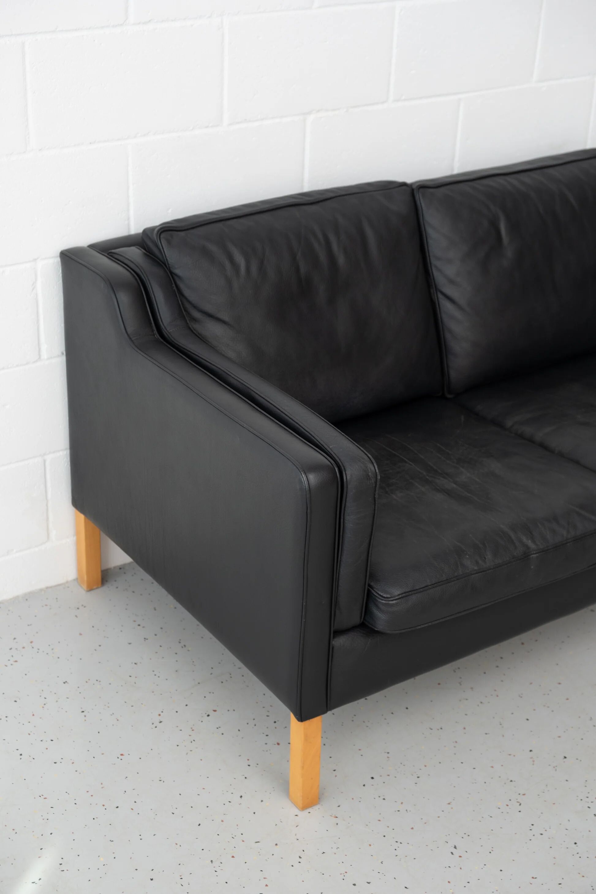 Stouby black leather sofa
