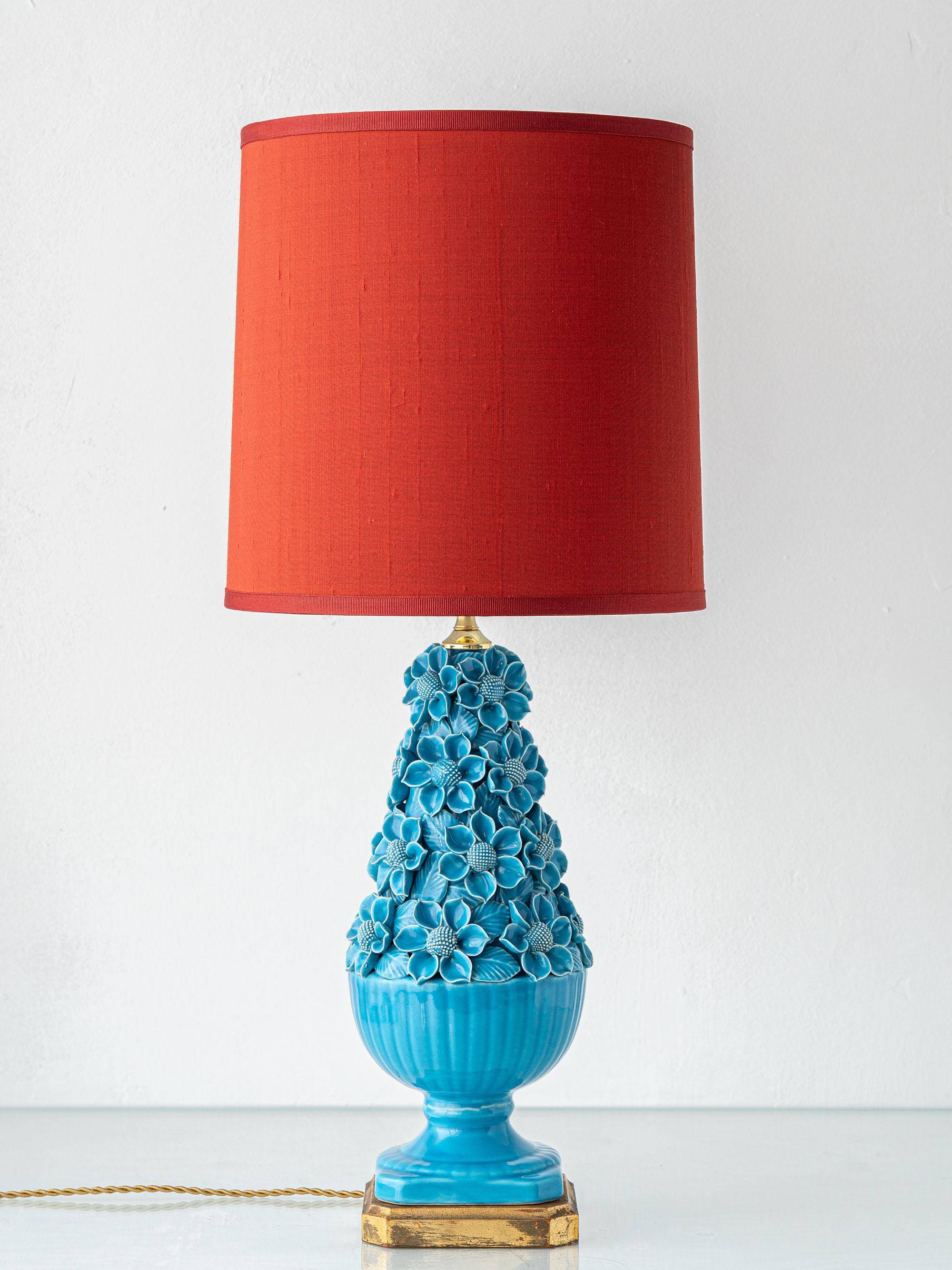 Turquoise glazed ceramic floral table lamp from Manises mid-century, with a new silk shade.