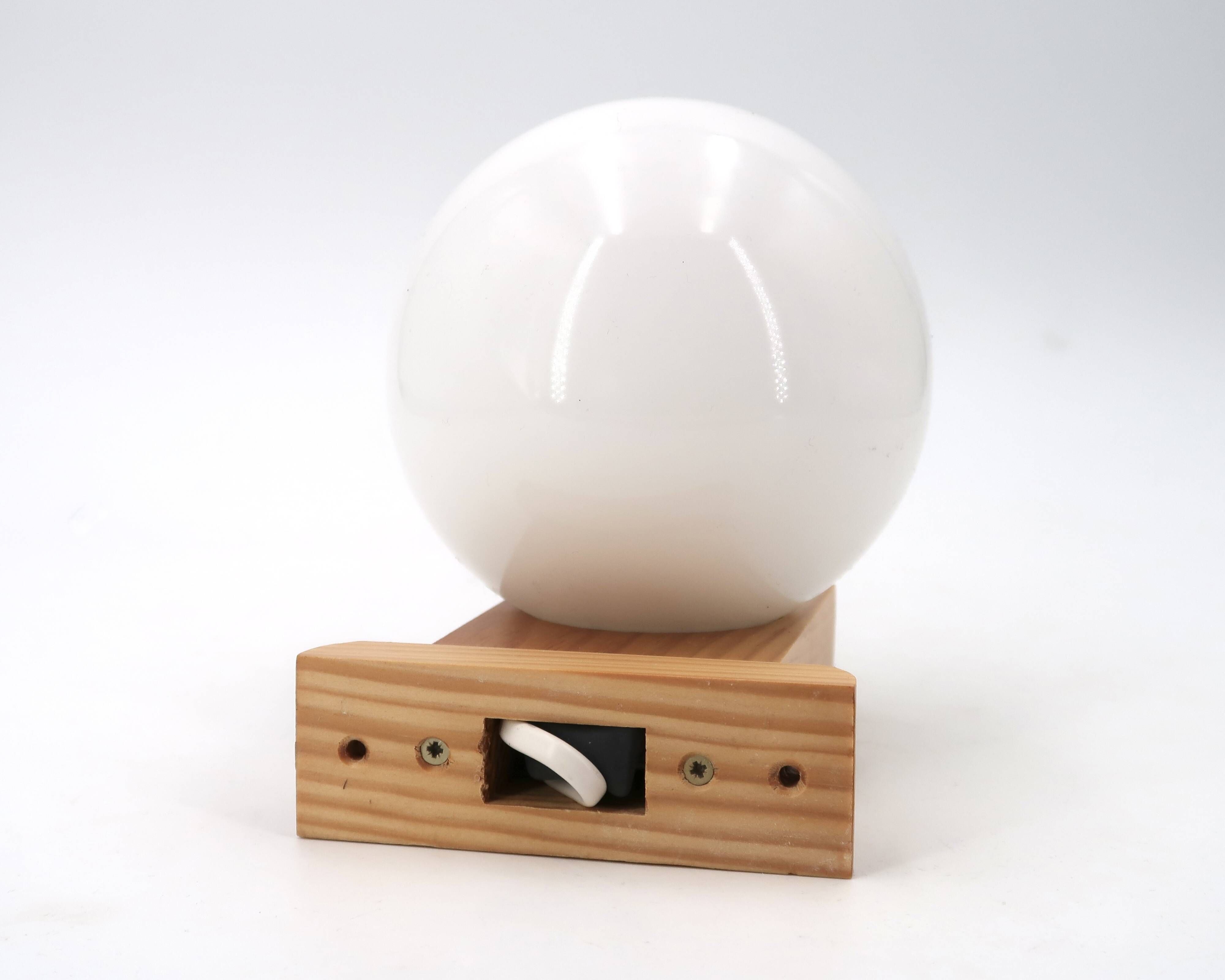 Wall light in pine wood with opaque white glass globe, 1980s