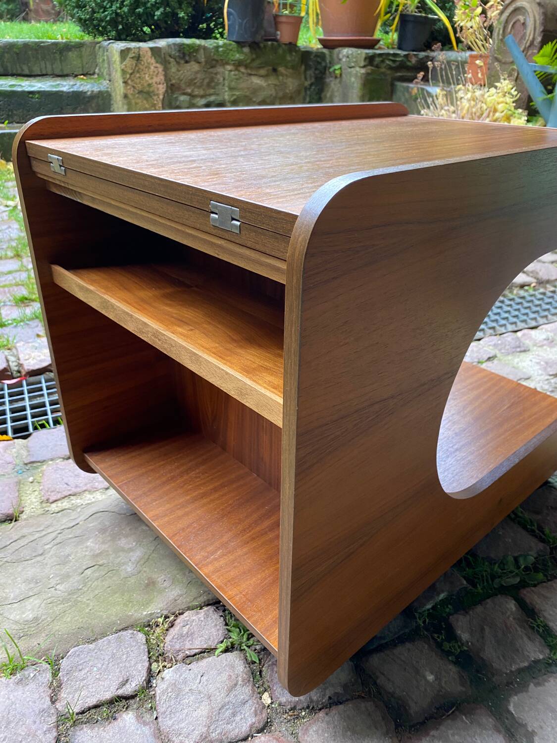 Rolling teak coffee table with foldable top circa 1960