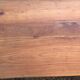 Antique cherry farmhouse table with turned legs and 2 drawers.