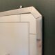 Bathroom mirror with art deco shelf