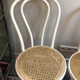 Couple of white bistro chairs