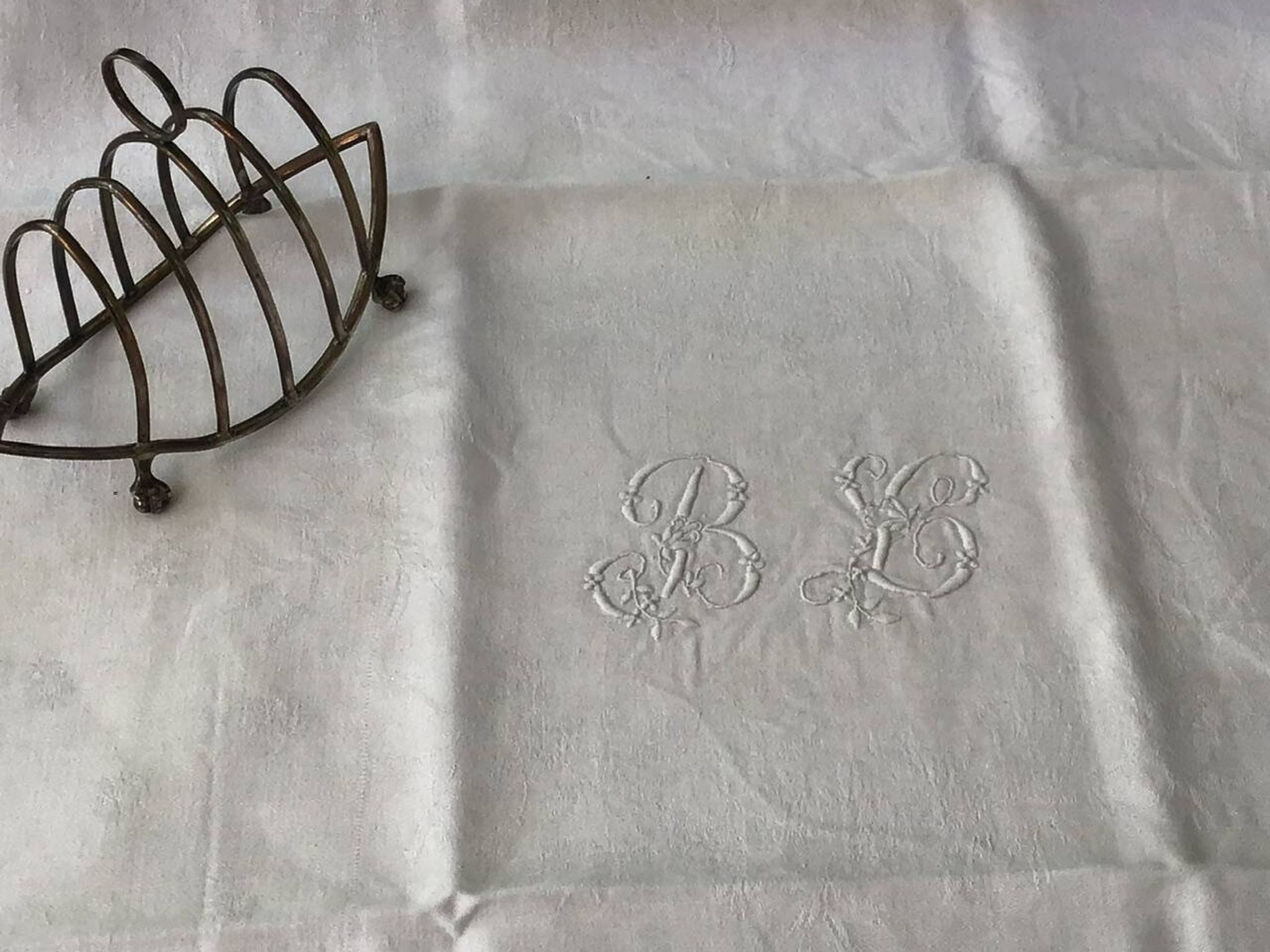 Set of 12 19th century white napkins marked “BL”