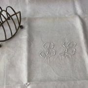 Set of 12 19th century white napkins marked “BL”