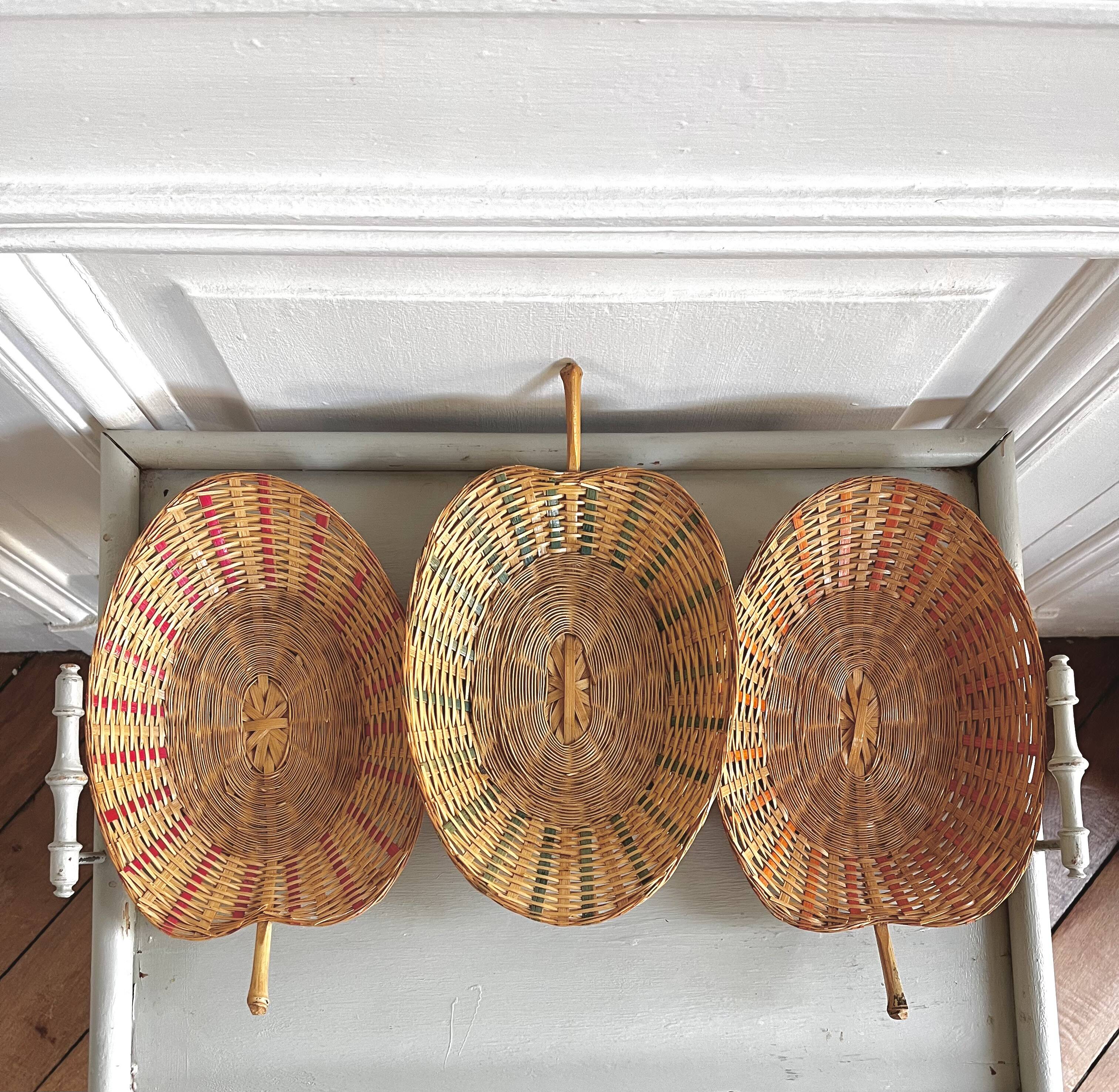 Trio of vintage wicker and bamboo baskets