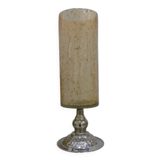 Amber cracked glass photophore on a metal stand, elegant candlestick, retro decor.