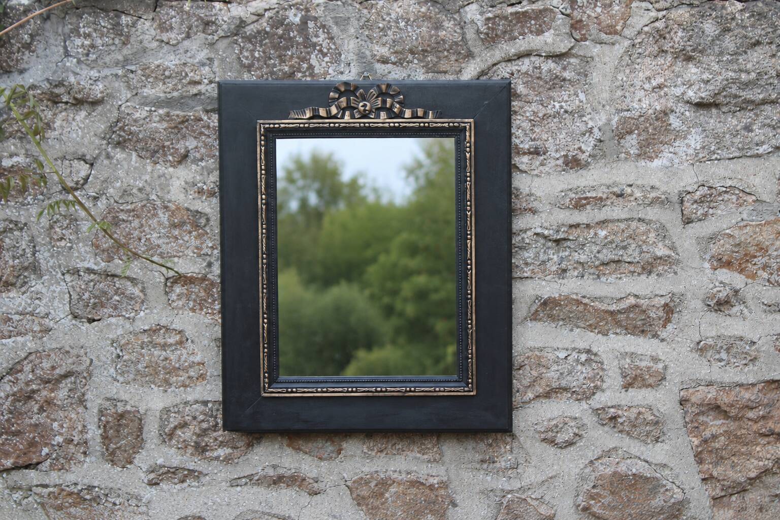 Vintage black and gold wooden mirror with a pediment – Napoléon III style